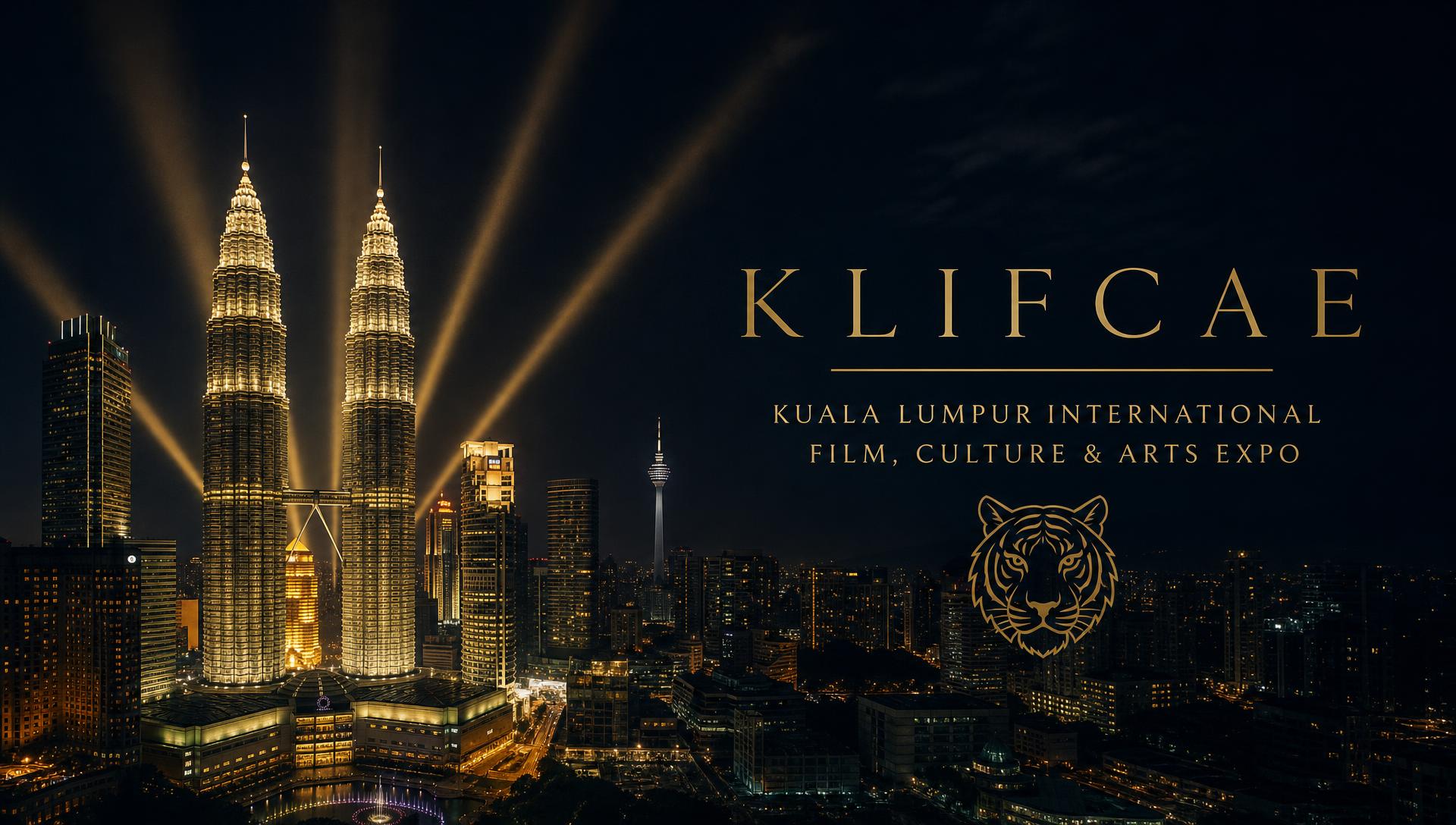 Kuala Lumpur skyline at night with festival searchlights